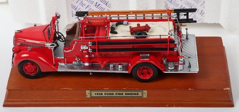 Five Franklin mint Fire Engine Models