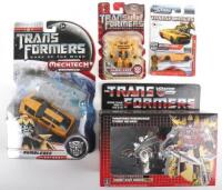 Three Hasbro Transformers Autobot Bumblebee models