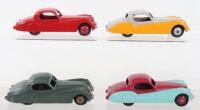 Four Unboxed Dinky Toys 157 Jaguar XK120