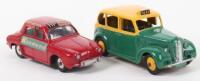 Two Unboxed Dinky Toy Taxi Models