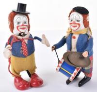 Two Schuco performing clown novelty toy