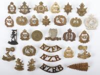 Grouping of New Zealand Regiments Collar Badges and Shoulder Titles