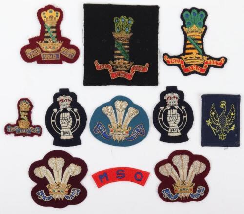 Grouping of Modern Cloth Cavalry Insignias
