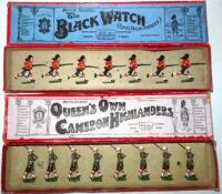 Britains set 11, Black Watch charging in original Whisstock box (Condition Good, one man missing, box Fair, no insert card) and set 114, Cameron Highlanders in foreign service dress, marching at the slope, Wolseley helmets, in original Whisstock (Conditio