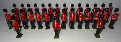 Britains set 2082, Coldstream Guards at attention with two further sets and Officers, and seven additional Men (Condition Very Good, some dents in bearskins, five embellished with buff facings, possibly some retouching to bearskins) 1954 (31)