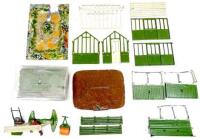 Britains Miniature Gardening Garden Shelter and Greenhouse (both damaged) a box of broken cork lawn, thirty-seven paving pieces, lawn mower, pond, lily, two sundials, sixty-five flowers, six rockery pieces, cold frame, seven trellis, two benches, eleven p