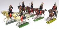 German made 50mm scale French Cavalry two Dragoons with two Officers, Cuirassier and a British 12th Lancer (Condition Very Good-Good, three saddles without stirrups) (6)