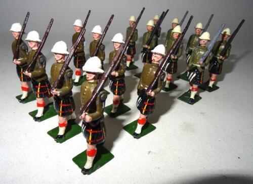 Britains set 114, Cameron Highlanders marching at the slope, khaki foreign service order (Condition Very Good, possibly some retouching) and another set (Condition Good-Fair) 1946 (16)