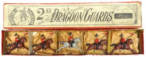 Britains set 44, 2nd Dragoon Guards with Trumpeter, 'Rocking Horses', in original un-numbered compartmented box (Condition Very Good, box Fair) 1896 (5)