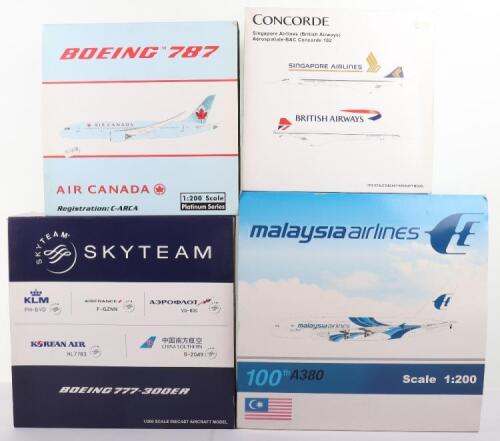 Four 1:200 scale Diecast model Passenger Planes