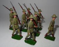 Britains set 1544, Australian Infantry marching at the slope, EARLY POST-WAR VARIATION, green bases, yellow buttons and fixed bayonets (Condition Good) 1947, with various repainted New Zealand Infantry at the slope from set 1542 and a converted mounted of