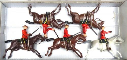 Britains set 1349, Royal Canadian Mounted Police mounted with Officer ,six Fijian Police by Ruddle and four by Nostalgia with Officers, and Britains repainted US Military Police (Condition Very Good) (24)