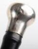 Four ebonised walking canes, - 11