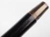 Four ebonised walking canes, - 13
