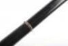 Four ebonised walking canes, - 21