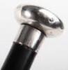 Five silver topped ebonised canes, - 10