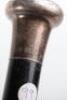 Five silver topped ebonised canes, - 19