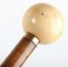 A fine 19th century tapering walking cane with large ivory ball handle,