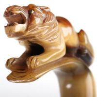 A fine 19th century carved lion walking cane, possibly rhinoceros horn