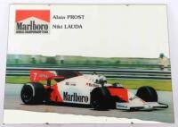 A Malboro mirrored sign with the McLaren Formula One car of Niki Lauda and Alain Prost