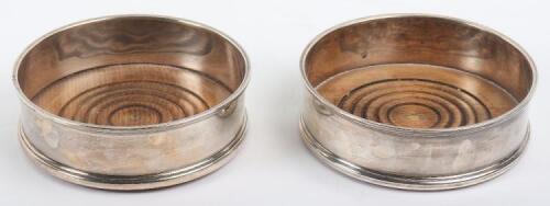 A pair of 20th century silver wine coasters, London 1979