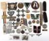 A mixture of German reproduction and original badges
