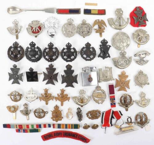 A mixture of mostly British badges, reproduction and original