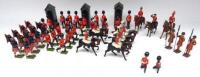 Britains Household Division five Life Guards (embellished in white) HM Queen (repainted, plume missing), two Generals, three Yeomen, Foot Guards and three sentry boxes (Condition Good, ten postwar, two dented, three bayonets and one rifle tip missing) (45