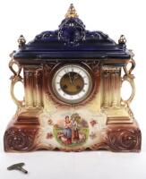 A 19th century painted ceramic cased mantle clock