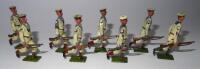 Britains from set 80, Royal Navy Whitejackets running at the trail, including one late painting with green puttees c.1939 (Condition Good, one Fair, figures not matching) (8)