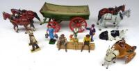 Britains set 5F Farm Wagon (Condition Good, Carter and shafts missing) Taylor and Barrett Llama Cart with two Children and various other people, two carthorrses and a lying cow (Condition Good, one Poor) (19)