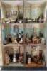 A large furnished Silber & Fleming painted wooden box-back dolls house, German 1880s, - 2