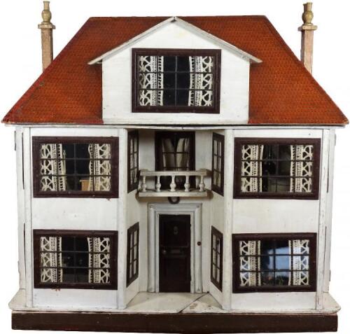 A large and impressive Lines Bros Triang painted wooden dolls house, English 1920s,