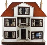 A large and impressive Lines Bros Triang painted wooden dolls house, English 1920s,