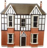 A large Tudor style painted wooden dolls house, English 20th century,