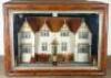 A charming model cottage in glass case, English 1906,