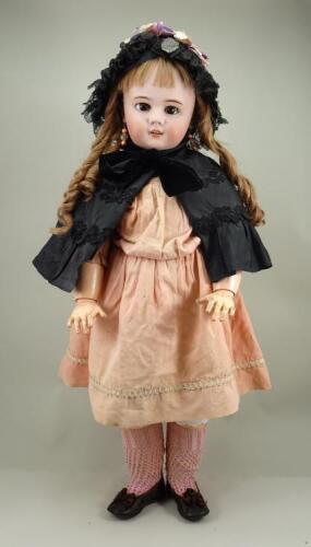 A large DEP bisque head doll, German for French market, circa 1910,