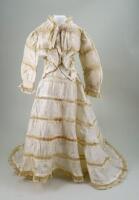 A cream silk dress for large French fashion doll, 1890s,