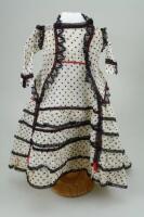 A good 1860s style cream and black polka dot French fashion dolls dress and jacket,