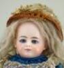 A scarce Simon & Halbig DEP 719 bisque shoulder head doll with swivel neck, German 1890s, - 2