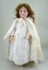 A Schonau & Hoffmeister 5800 bisque head doll, German circa 1910,