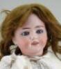 A Schonau & Hoffmeister 5800 bisque head doll, German circa 1910, - 2