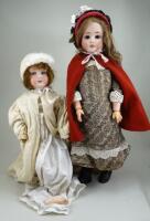 A Schoenau & Hoffmeister 1906 bisque head doll, German circa 1910,