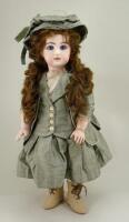 A reproduction Tete Jumeau bisque head doll by Carol Stanton, 1988,