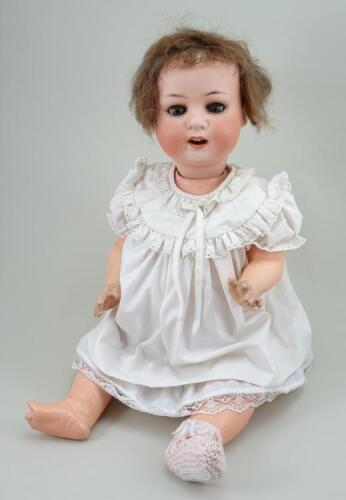 A Heubach Koppelsdorf 300 bisque head baby doll, German circa 1915,