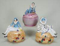 Glazed china Pierrot and Pierrette dressing table boxes, 1920s,