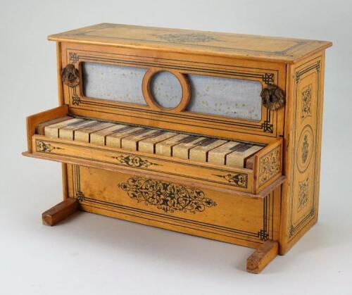 A Victorian child&rsquo;s miniature wooden upright toy piano, German,