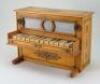 A Victorian child&rsquo;s miniature wooden upright toy piano, German,