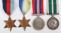 Historically Interesting Royal Naval Reserve Long Service Medal Group of Four, Crewman of the Armed Merchant Cruiser HMS Voltaire, Who Was Taken Prisoner of War After the Gallant Last Stand Action Against the German Auxiliary Cruiser Thor, off the Cape Ve
