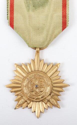Third Reich Ostvolk (Eastern Peoples) Decoration 2nd Class in Gold with Swords